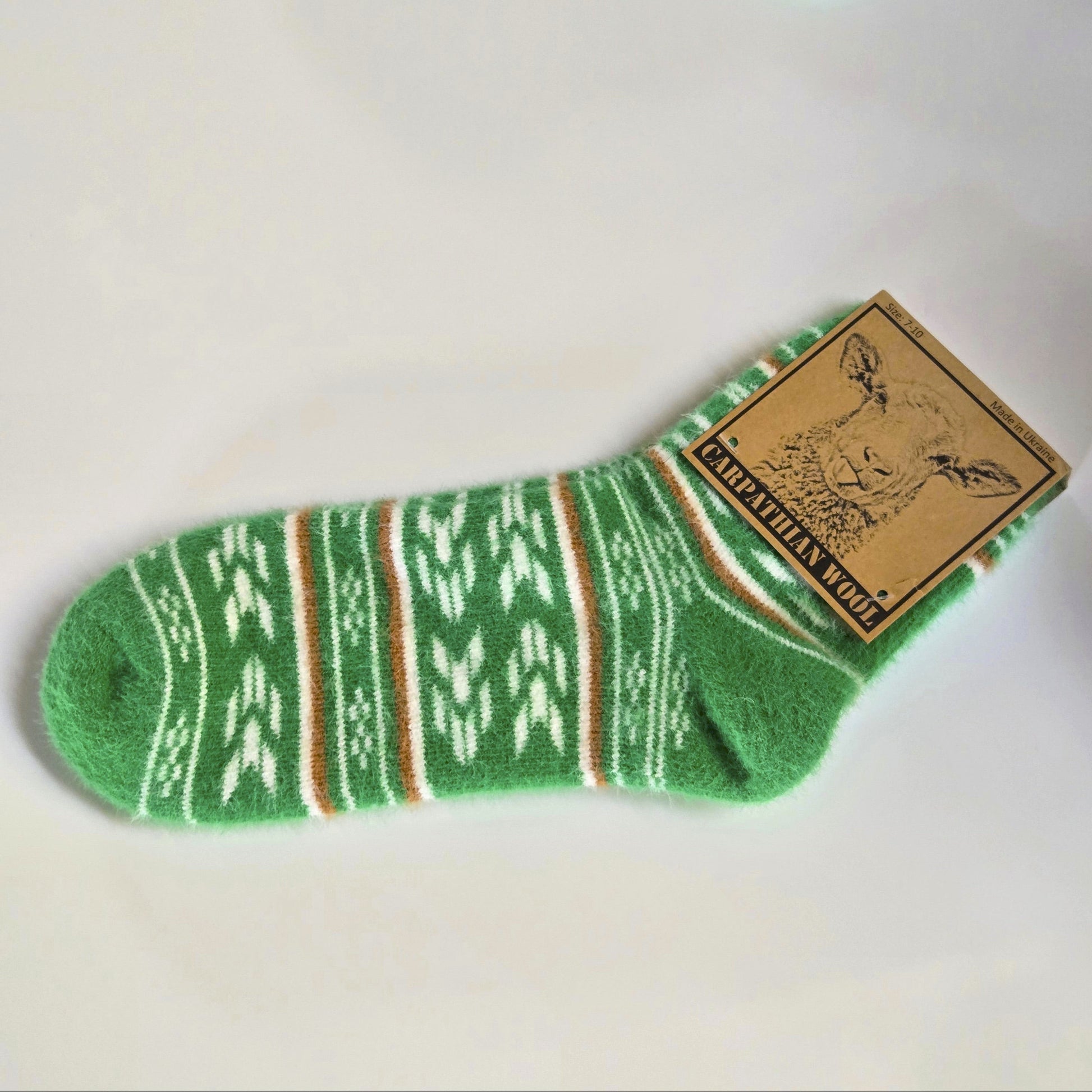 Green patterned sock with a brand label on a white background